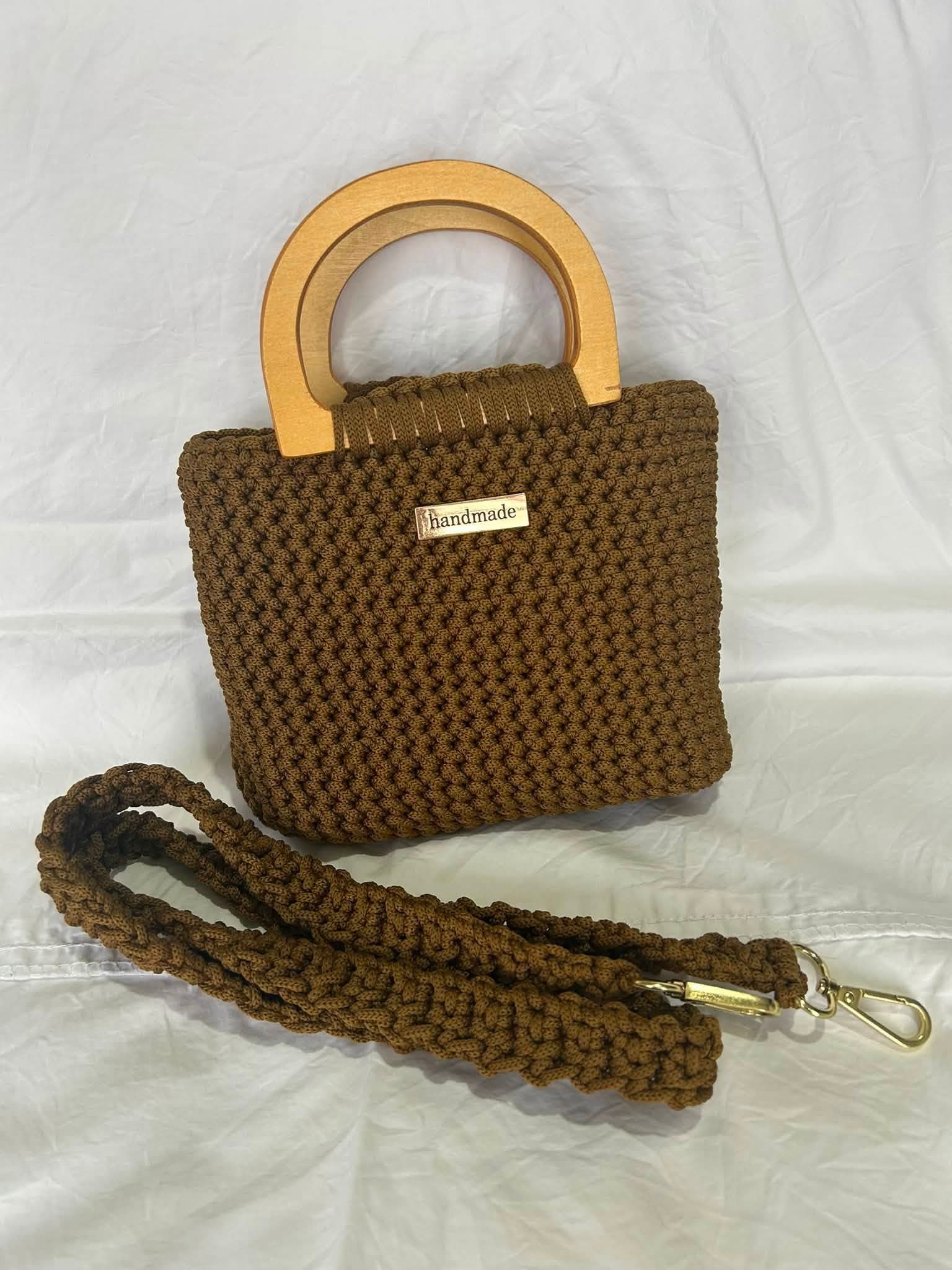 Brown crochet tote with wooden handles and removable strap