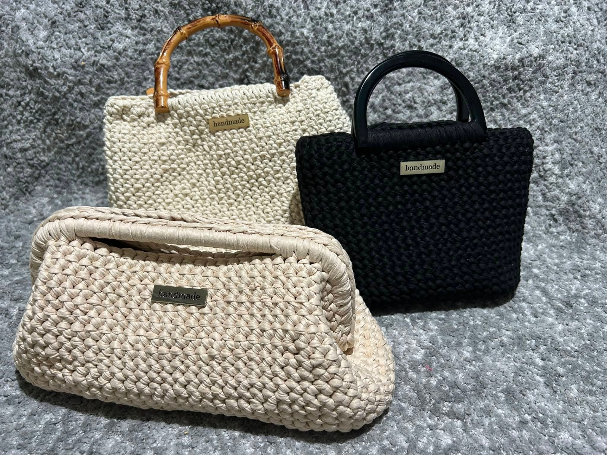 Ali’s cream and black crochet totes with a cream framed clutch